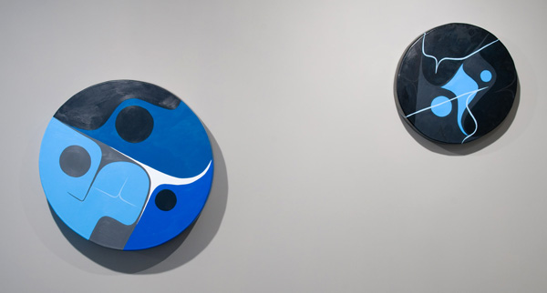 (l-r) Disconnected 3 and 2, acrylic on cow hide, 28 inches and 18 inches diameter, 2009